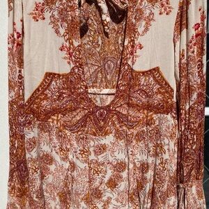 Backless long sleeve Free People bold flower top